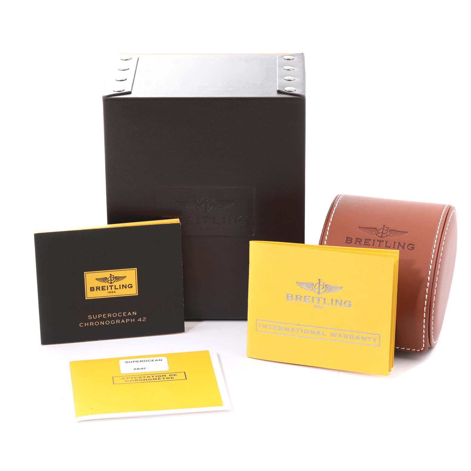 This image shows the packaging, manuals, warranty booklet, and watch case for the Breitling Superocean A13311 Men's Stainless Steel Blue Dial A13311 Men's Stainless Steel Blue Dial model.