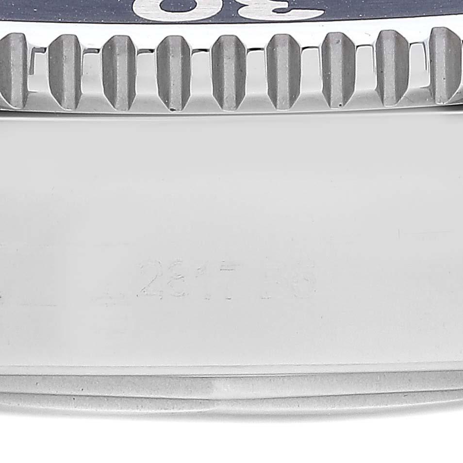 This image shows the side view of the bezel and part of the case of a Breitling Superocean A13311 Men's Stainless Steel Blue Dial A13311 Men's Stainless Steel Blue Dial watch.