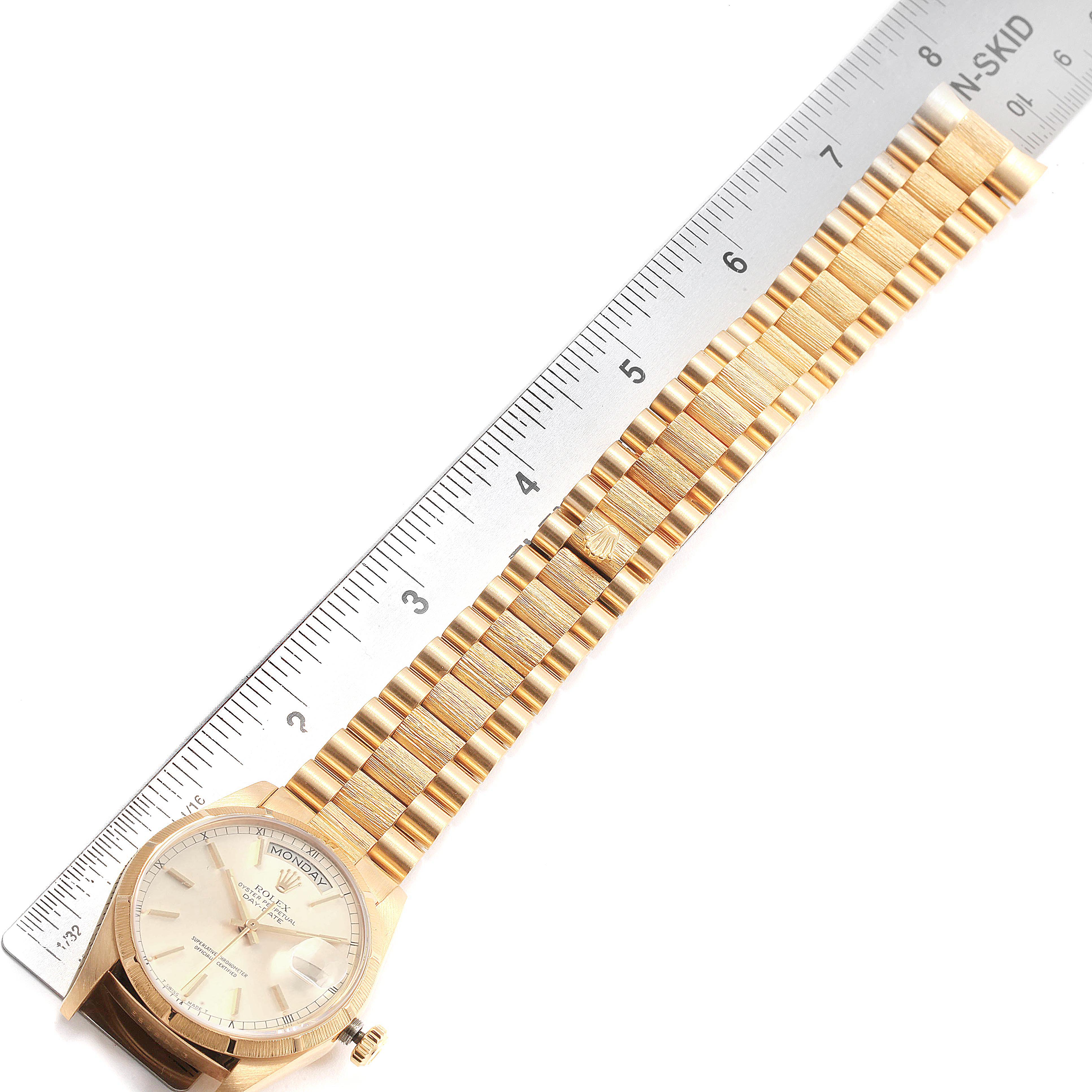 The image shows a Rolex President 18248 Men's Yellow Gold Silver Dial 18248 Men's Yellow Gold Silver Dial model watch, displaying the face and bracelet, with a ruler for size comparison.