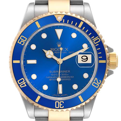 The Rolex Submariner 16613 Men's Steel and Gold (two tone) Blue Dial watch is shown from a front angle, displaying the blue dial, bezel, gold accents, and the date window.