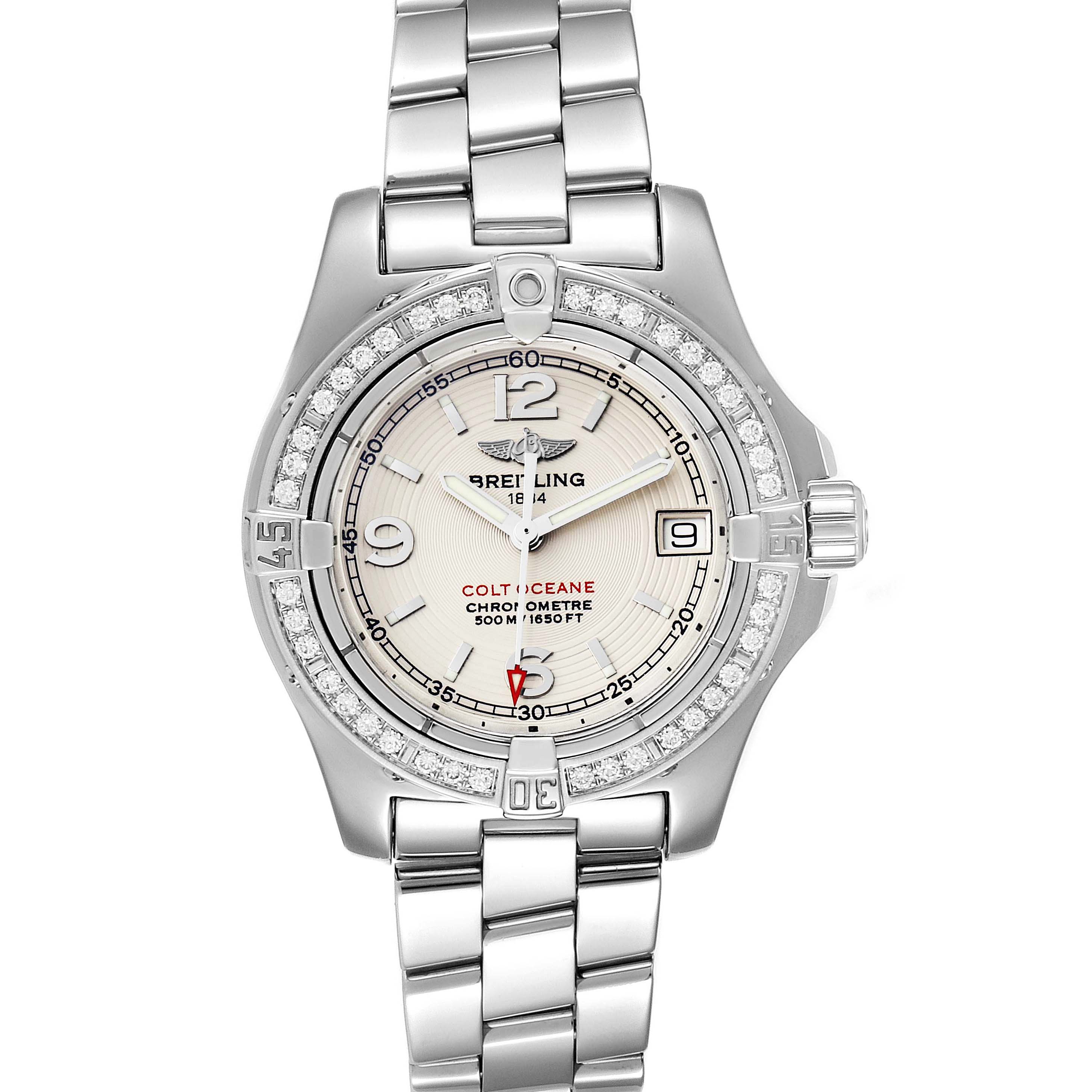 The Breitling A77380 Women's Stainless Steel Silver Dial A77380 Women's Stainless Steel Silver Dial Colt Oceane A77380 watch is shown from a top view, highlighting its stainless steel and diamond bezel with a metal bracelet.