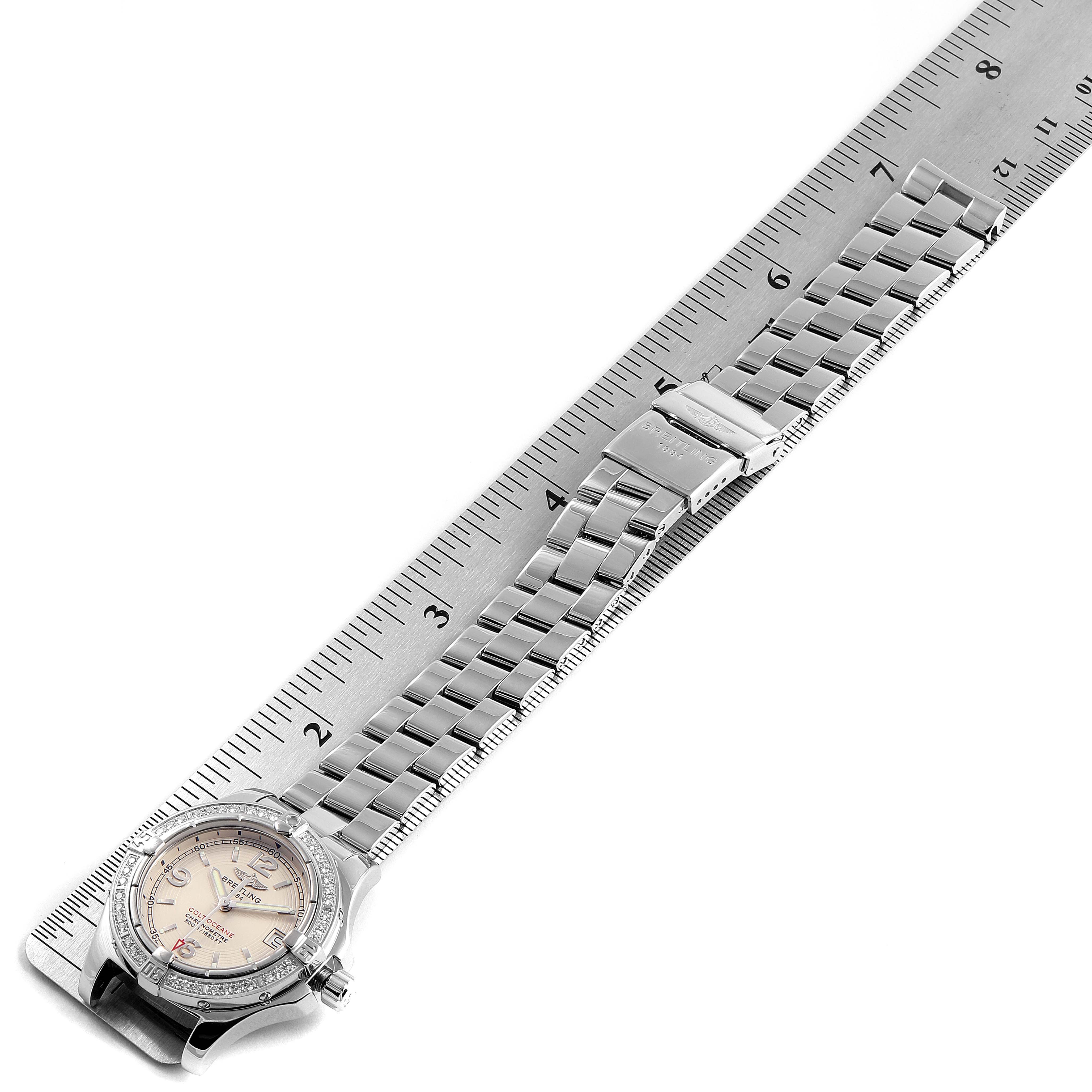 The image shows the front view of a Breitling A77380 Women's Stainless Steel Silver Dial A77380 Women's Stainless Steel Silver Dial Colt Oceane Stainless Steel Diamond Ladies Watch A77380, alongside a measuring ruler.