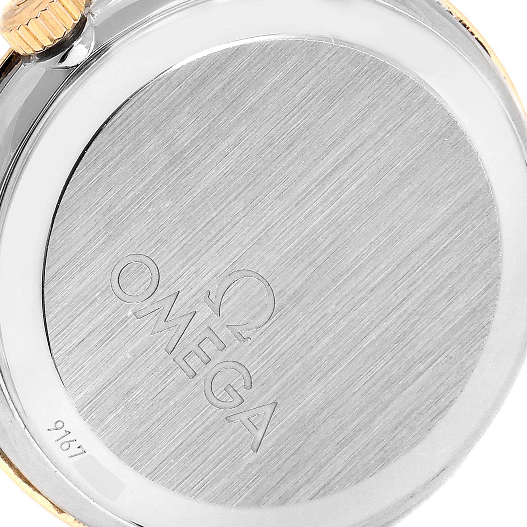 The image shows the back case and crown of the Omega 413.25.27.60.05.001 Women's Steel and Gold (two tone) Mother of Pearl Dial 413.25.27.60.05.001 Women's Steel and Gold (two tone) Mother of Pearl Dial DeVille Prestige Steel Yellow Gold Diamond Watch 413.25.27.60.05.001.