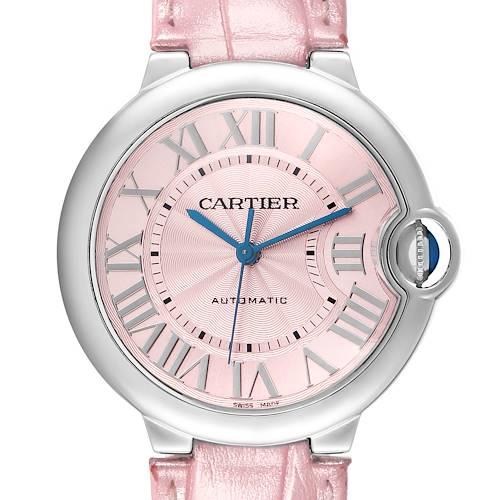 The Cartier Ballon Bleu WSBB0007 Women's Stainless Steel Pink Dial watch is shown from the front, featuring a pink dial, Roman numerals, and a pink leather strap.