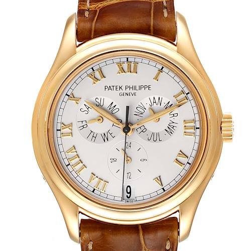 The image shows a front view of the Patek Philippe 5035 Men's Yellow Gold Silver Dial 5035 Men's Yellow Gold Silver Dial Complicated Annual Calendar Yellow Gold Men's Watch 5035 model, displaying its face and brown leather strap.