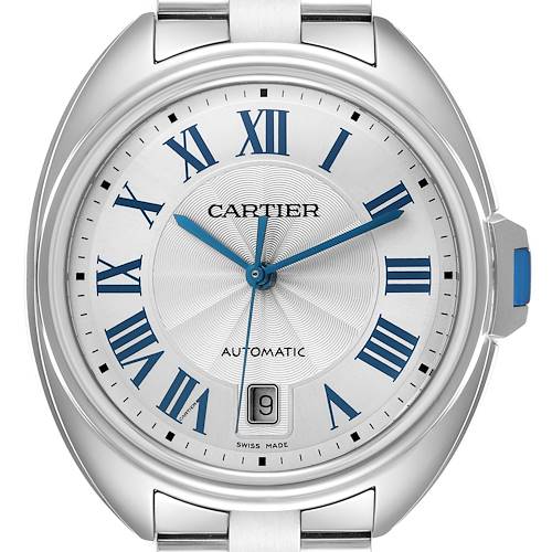 The Cartier Clé watch is shown front-on, displaying the face, Roman numerals, hands, crown, and date window.