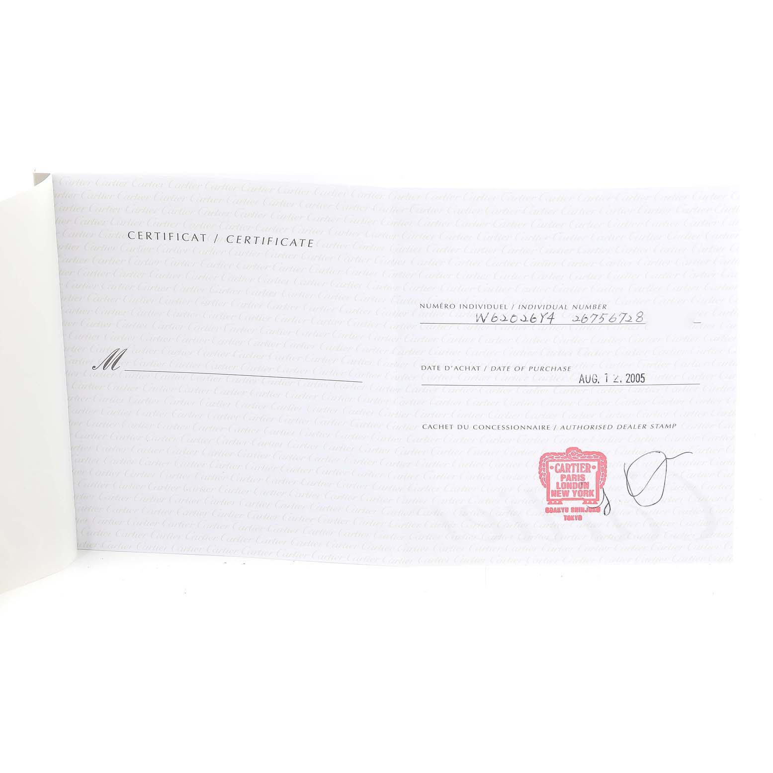 The image shows an open certificate booklet for the Cartier Roadster W62026Y4 Women's Steel and Gold (two tone) Silver Dial W62026Y4 Women's Steel and Gold (two tone) Silver Dial watch model, displaying purchase details and dealer stamp.