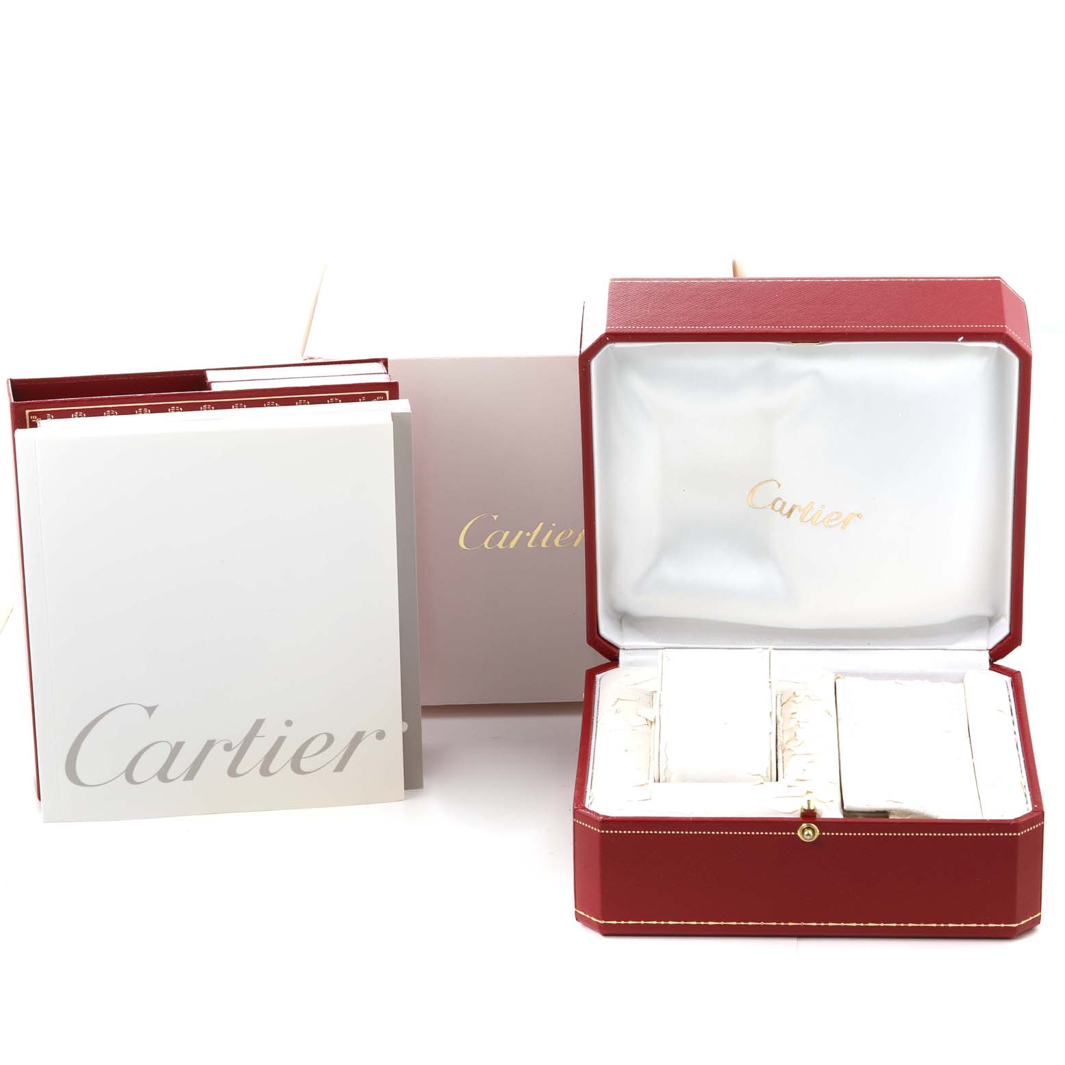 The image shows the packaging and accessories for a Cartier Roadster W62026Y4 Women's Steel and Gold (two tone) Silver Dial W62026Y4 Women's Steel and Gold (two tone) Silver Dial watch, including the booklet, outer box, and inner red watch box.