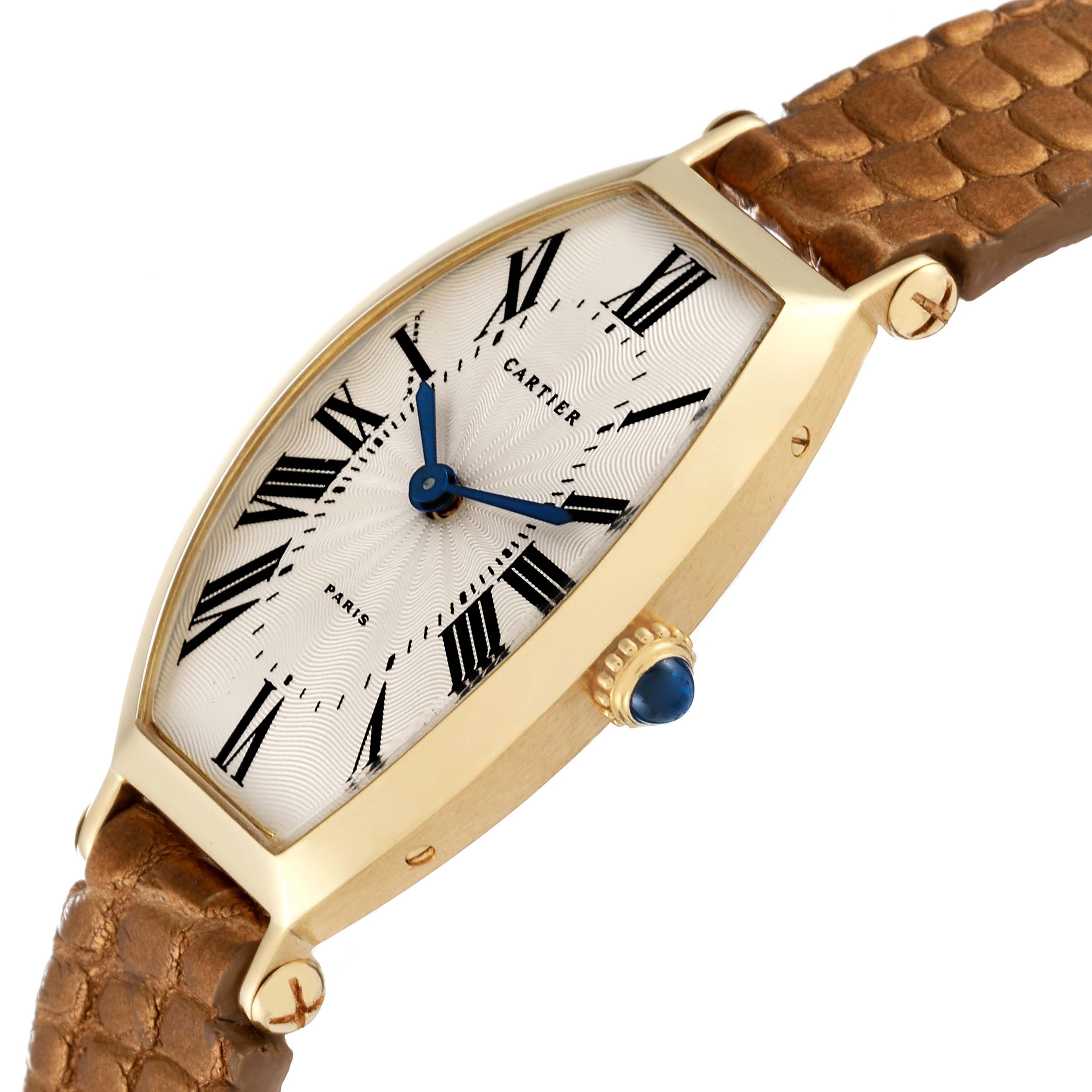 The image shows a side angle of the Cartier Tonneau Women's Yellow Gold Silver Dial Women's Yellow Gold Silver Dial model, displaying its gold casing, leather strap, and blue crown.