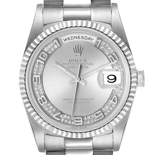 The image shows a front view of a Rolex Oyster Perpetual Day-Date President watch, displaying the bezel, dial, hands, day, and date.