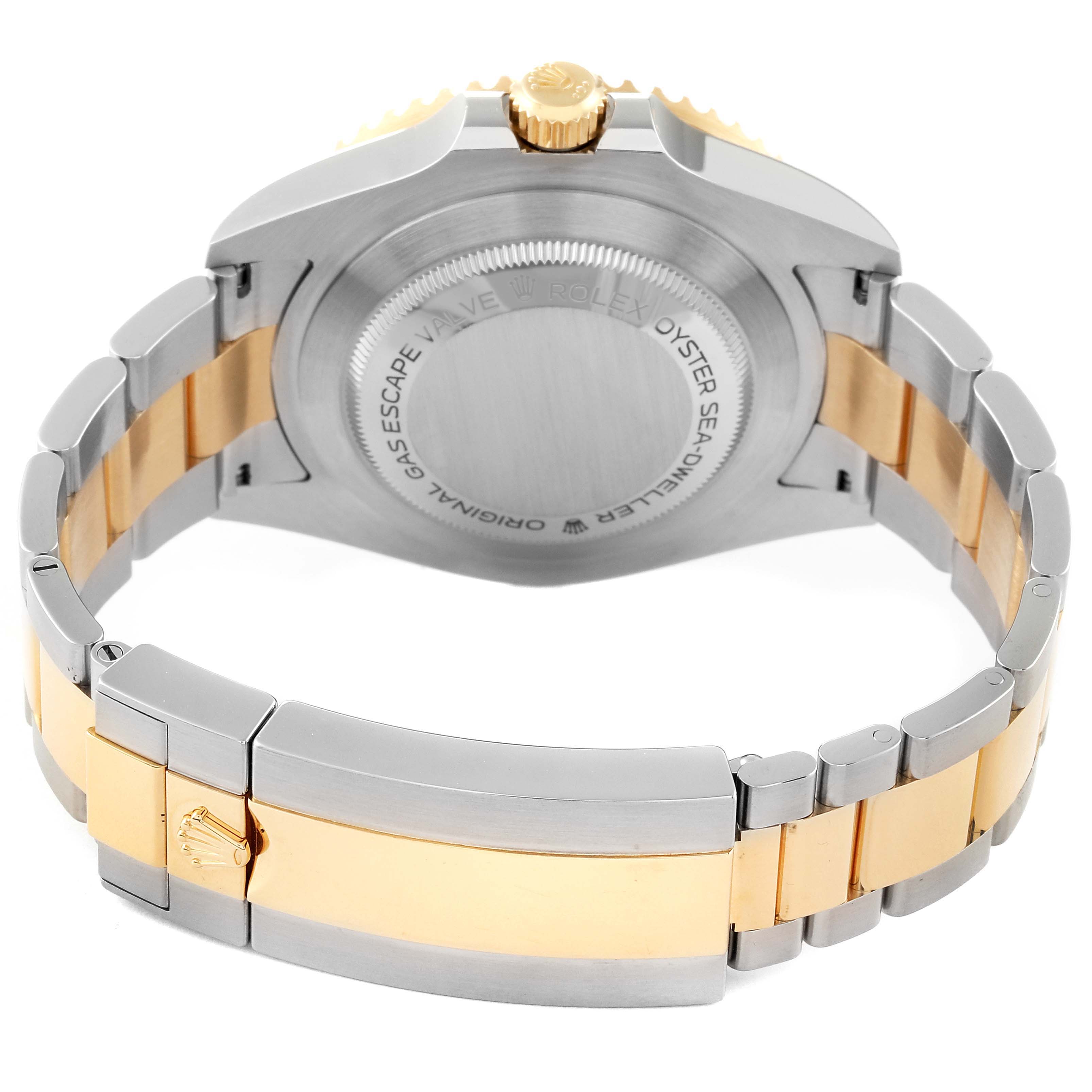 The image shows the back view and bracelet of a Rolex Sea-Dweller 126603 Men's Steel and Gold (two tone) Black Dial 126603 Men's Steel and Gold (two tone) Black Dial watch, highlighting the two-tone metal and clasp.