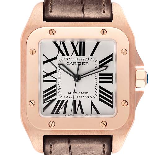 This image shows a close-up of the Cartier Santos W20095Y1 Men's Rose Gold Silver Dial W20095Y1 Men's Rose Gold Silver Dial watch face, bezel, screws, crown, and part of the leather strap.