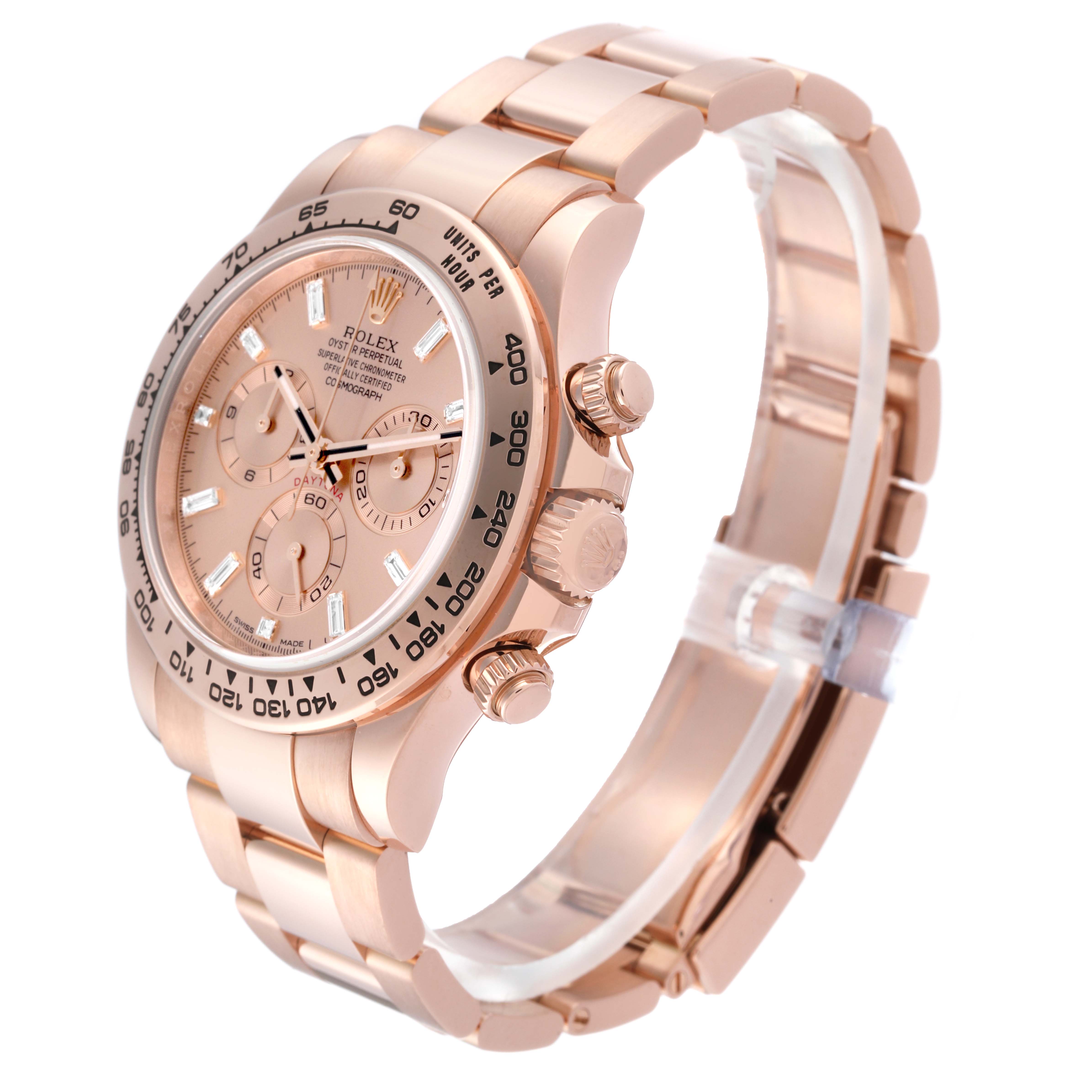 The Rolex Daytona 116505 Men's Rose Gold Pink Dial 116505 Men's Rose Gold Pink Dial watch is shown at a three-quarter angle, highlighting the face, pushers, and bracelet.