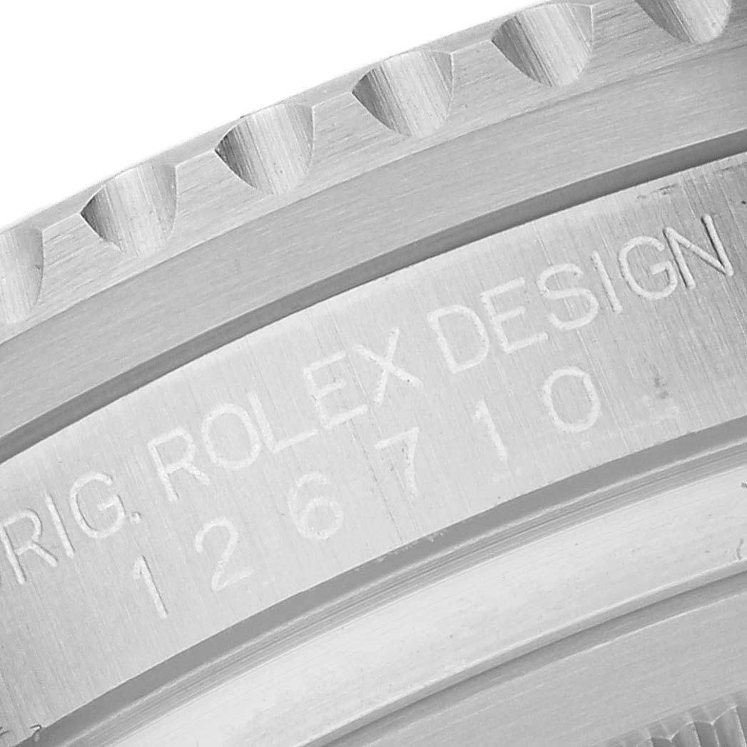 The image shows a close-up of the engraving and bezel detail for the Rolex GMT-Master 126710BLRO Men's Stainless Steel Black Dial 126710BLRO Men's Stainless Steel Black Dial watch model.