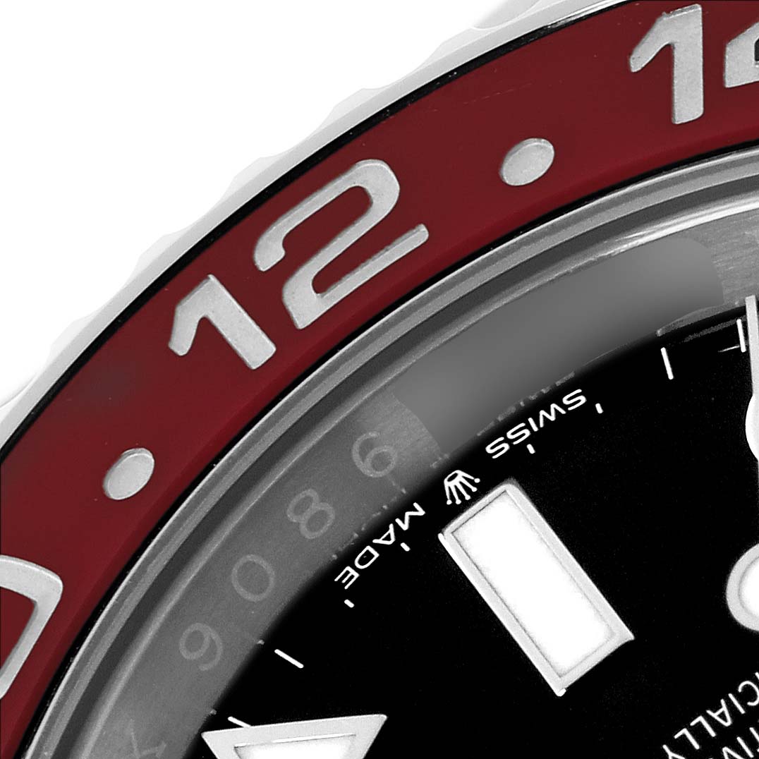 The image shows a close-up of the bezel and part of the dial of a Rolex GMT-Master 126710BLRO Men's Stainless Steel Black Dial 126710BLRO Men's Stainless Steel Black Dial watch.