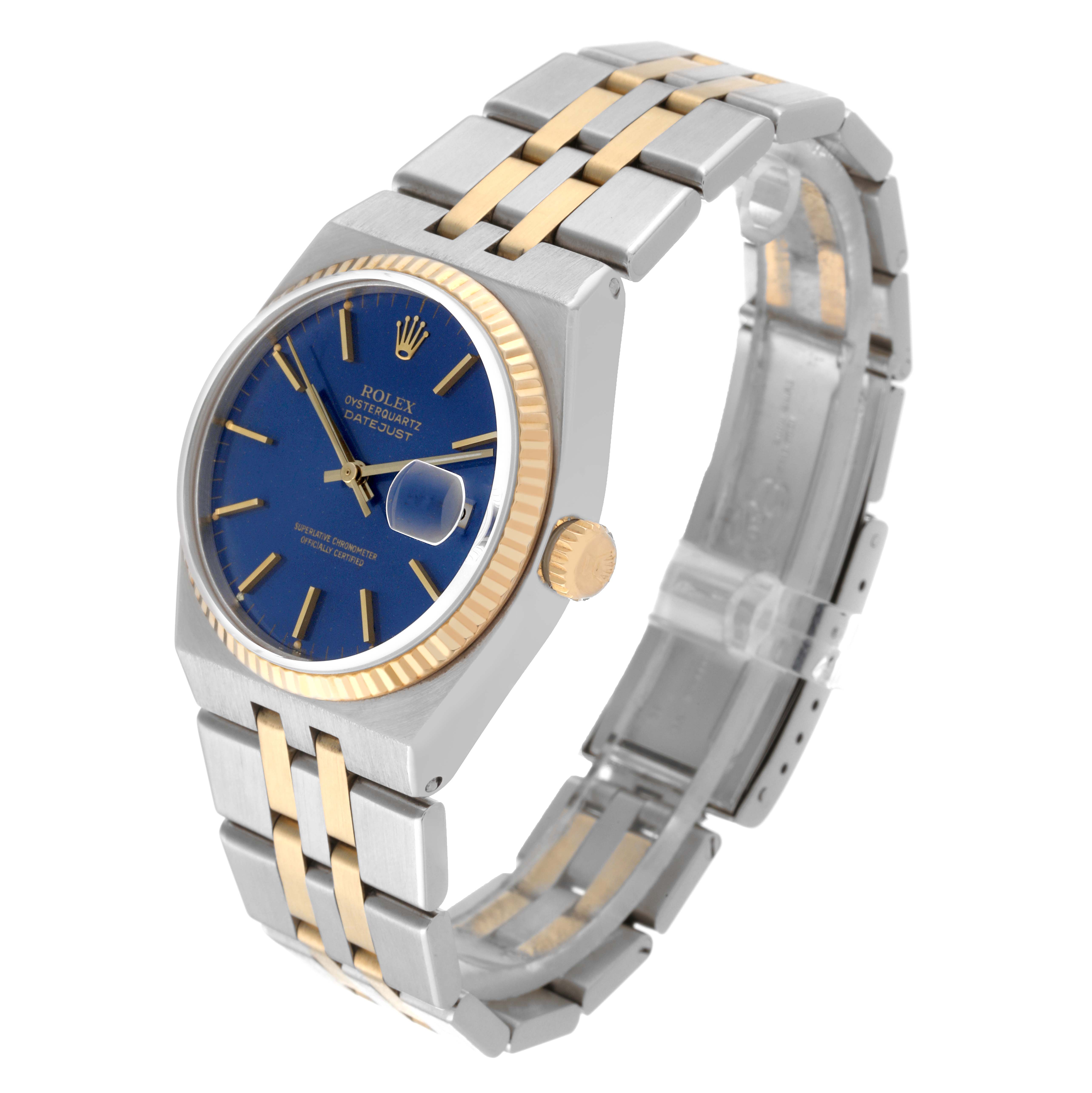 This Rolex Oysterquartz 17013 Men's Steel and Gold (two tone) Blue Dial 17013 Men's Steel and Gold (two tone) Blue Dial watch is shown at an oblique angle, displaying the face, bezel, crown, and part of the bracelet.