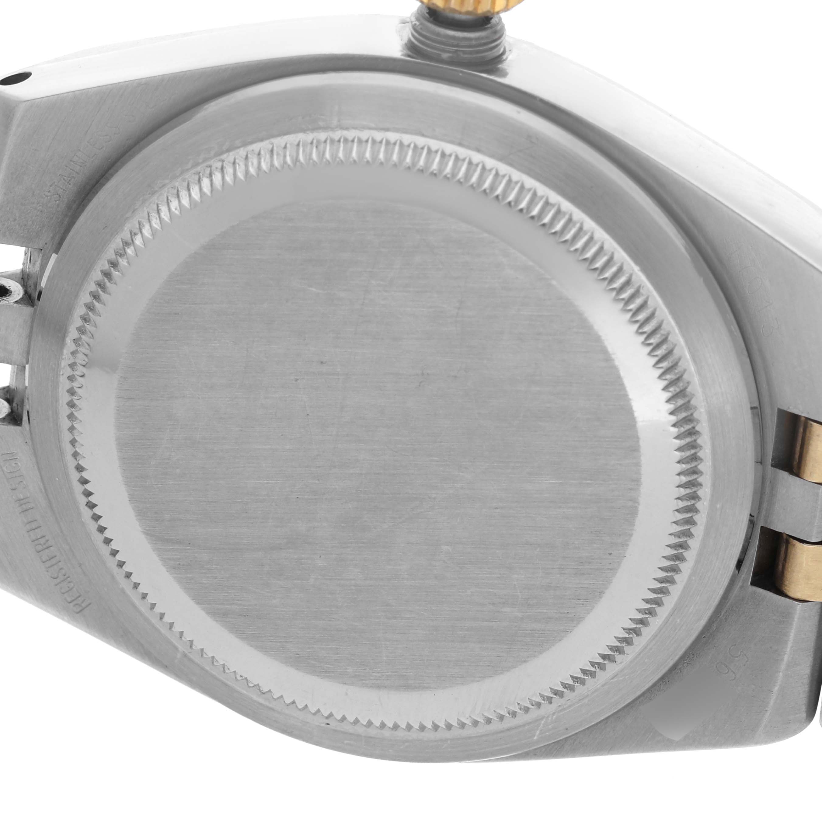 The image shows the case back and partially visible crown and bracelet of a Rolex Oysterquartz 17013 Men's Steel and Gold (two tone) Blue Dial 17013 Men's Steel and Gold (two tone) Blue Dial watch.