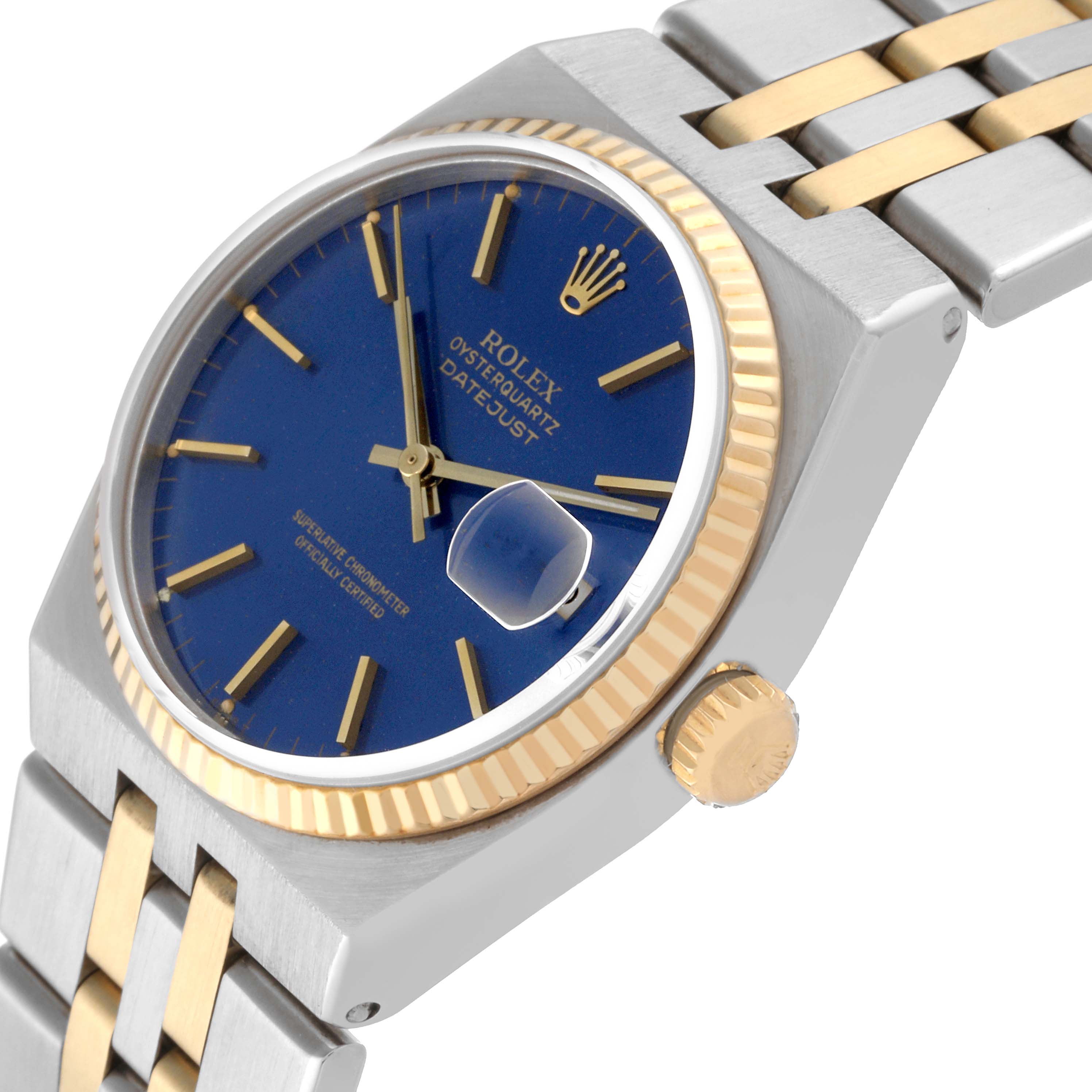The image shows a close-up angled view of a Rolex Oysterquartz 17013 Men's Steel and Gold (two tone) Blue Dial 17013 Men's Steel and Gold (two tone) Blue Dial Datejust watch, highlighting the blue dial, crown, and two-tone bracelet.
