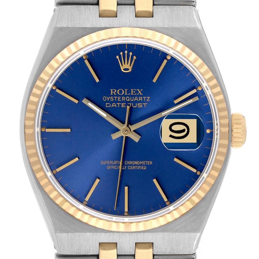 The Rolex Oysterquartz 17013 Men's Steel and Gold (two tone) Blue Dial 17013 Men's Steel and Gold (two tone) Blue Dial watch is shown from the front, displaying the blue dial, gold hands, date window, and part of the bracelet.