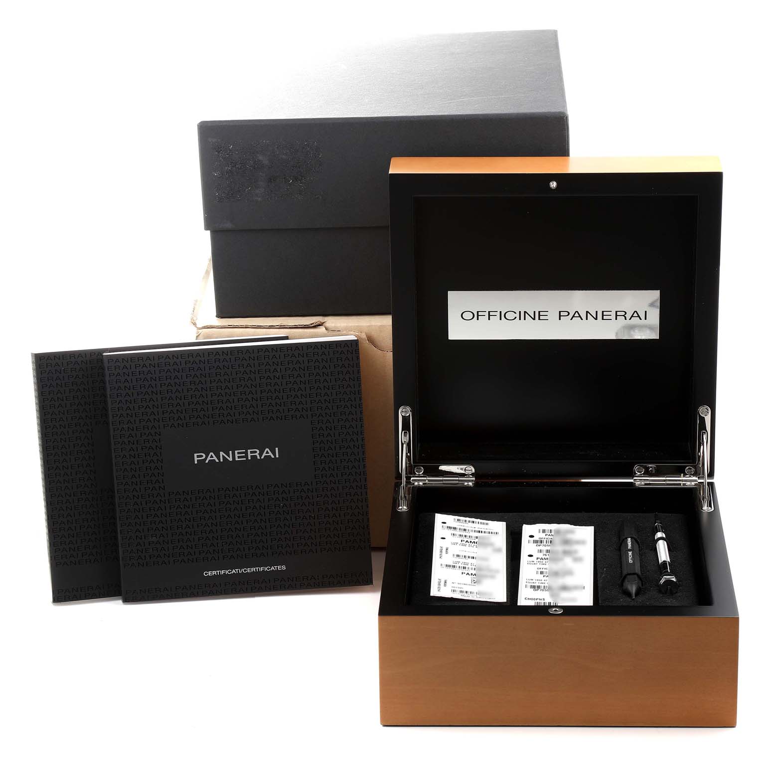 The image shows the packaging and accessories for a Panerai Luminor PAM00656 Men's Titanium Brown Dial PAM00656 Men's Titanium Brown Dial watch, including manuals, a box, and tools.