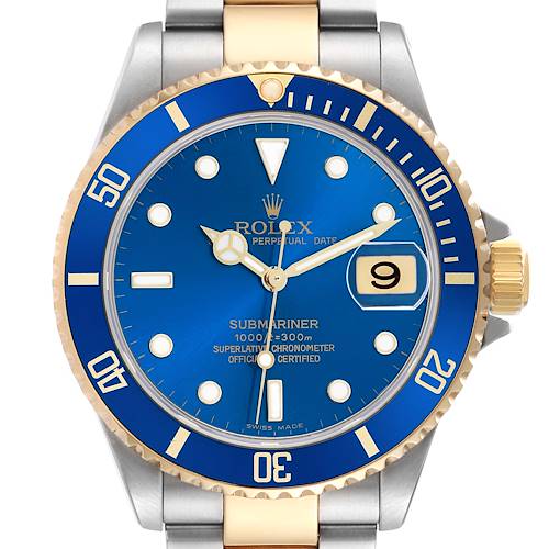 The Rolex Submariner 16613 Men's Steel and Gold (two tone) Blue Dial is shown from a front angle, highlighting the blue and gold bezel, dial, hands, and date window.