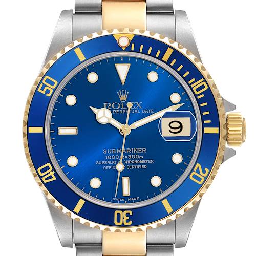 The Rolex Submariner 16613 Men's Steel and Gold (two tone) Blue Dial watch is shown from a front angle, highlighting its blue dial, bezel, cyclops date, and two-tone bracelet.