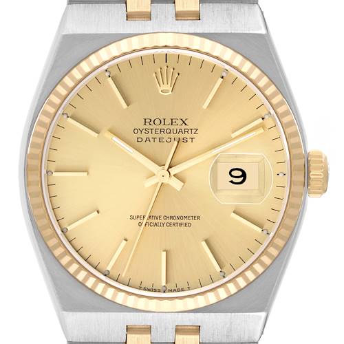 This image shows a close-up of the Rolex Oysterquartz 17013 Men's Steel and Gold (two tone) Champagne Dial 17013 Men's Steel and Gold (two tone) Champagne Dial Datejust's dial, bezel, crown, hands, and part of the bracelet.