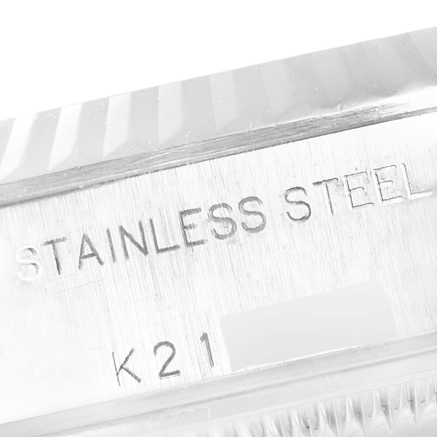 This image shows a close-up of the engraved markings on the case side of a Rolex Datejust 79174 Women's Stainless Steel Mother of Pearl Dial 79174 Women's Stainless Steel Mother of Pearl Dial model, indicating "Stainless Steel."