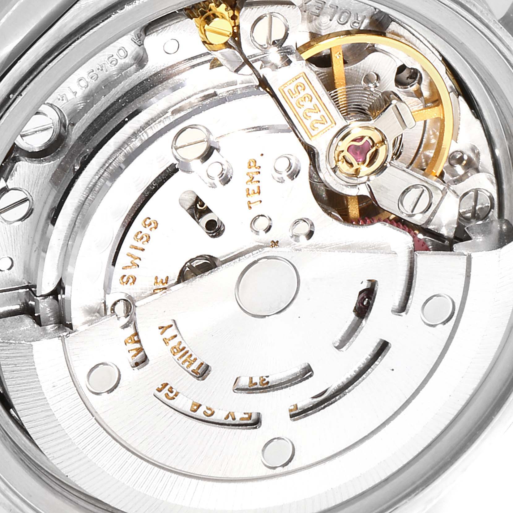 This image shows a detailed view of the movement mechanism inside a Rolex Datejust 79174 Women's Stainless Steel Mother of Pearl Dial 79174 Women's Stainless Steel Mother of Pearl Dial watch.