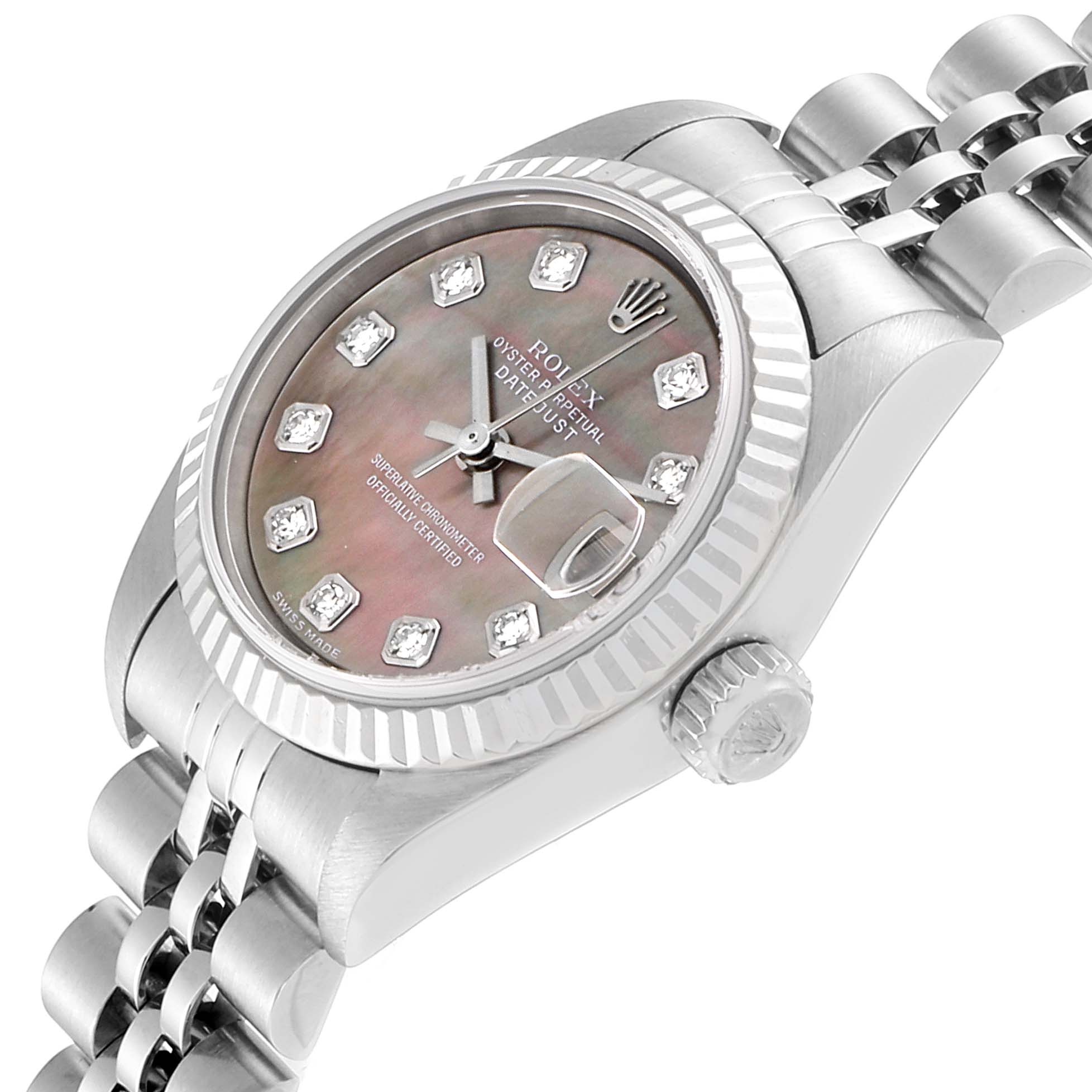 This image shows a close-up angled view of the Rolex Datejust 79174 Women's Stainless Steel Mother of Pearl Dial 79174 Women's Stainless Steel Mother of Pearl Dial watch's dial, crown, and part of the bracelet.