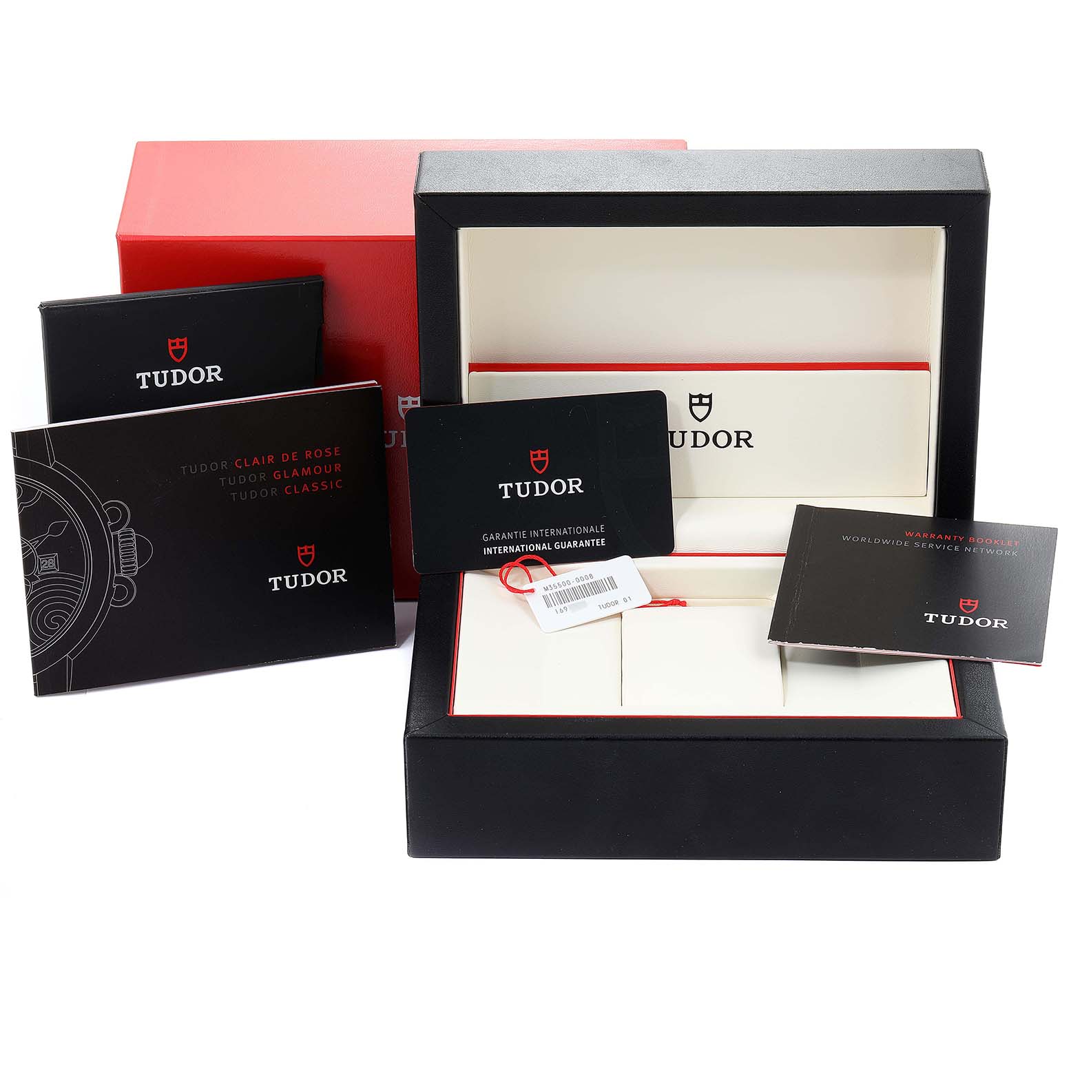 The image shows the Tudor Clair de Rose M35800-0006 Women's Stainless Steel Silver Dial M35800-0006 Women's Stainless Steel Silver Dial watch packaging, including the box, warranty card, brochures, and tags.