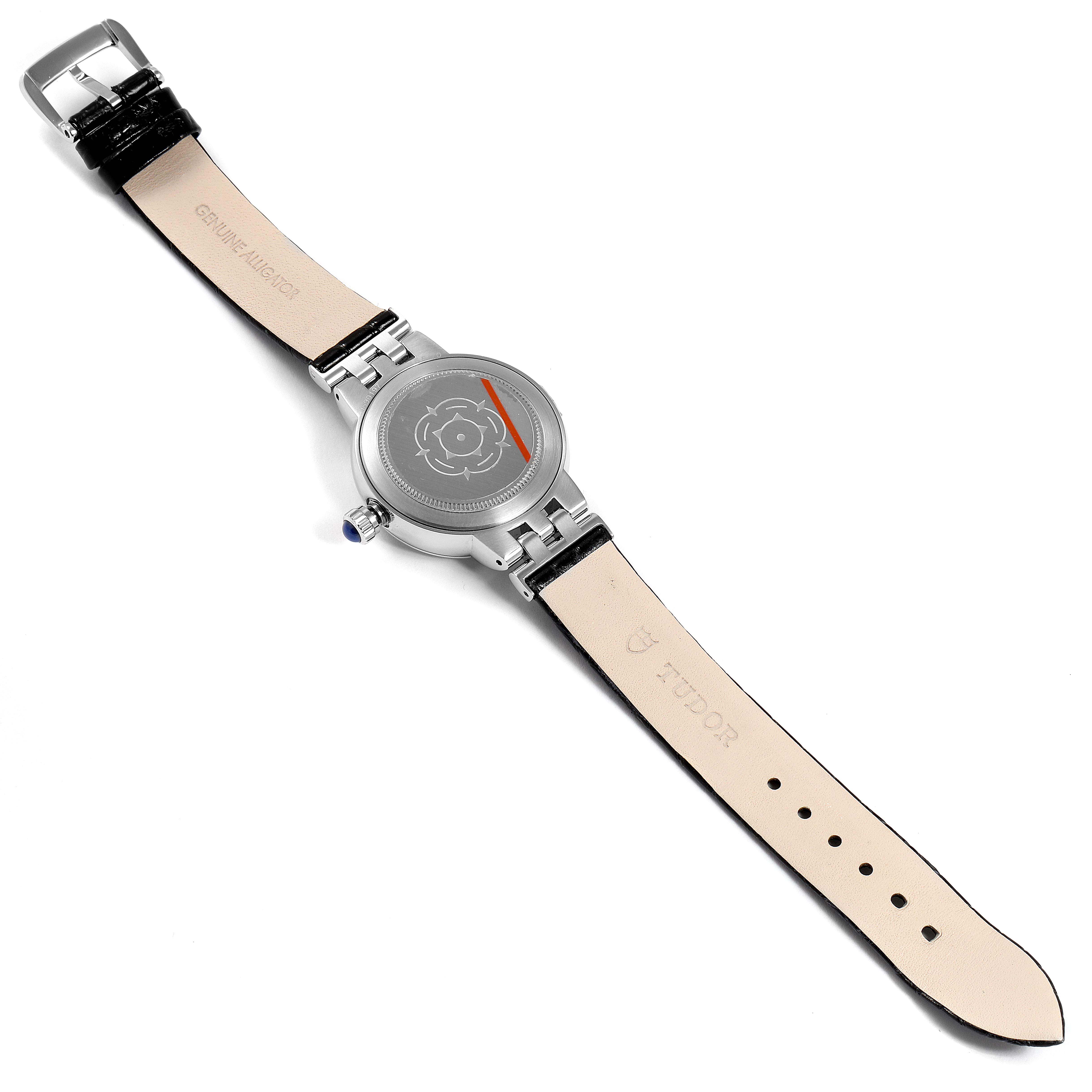 The image shows the back side of a Tudor Clair de Rose M35800-0006 Women's Stainless Steel Silver Dial M35800-0006 Women's Stainless Steel Silver Dial watch, including the leather strap and buckle.
