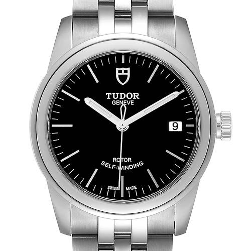 The image shows a front view of the Tudor Glamour M55000-0007 Men's Stainless Steel Black Dial M55000-0007 Men's Stainless Steel Black Dial watch, displaying its face, bezel, and part of its metal bracelet.