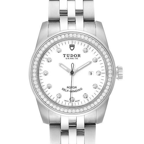 The image shows the front view of the Tudor Glamour M53020-0074 Women's Stainless Steel White Dial M53020-0074 Women's Stainless Steel White Dial model watch, displaying its dial, bezel, hands, and part of the bracelet.