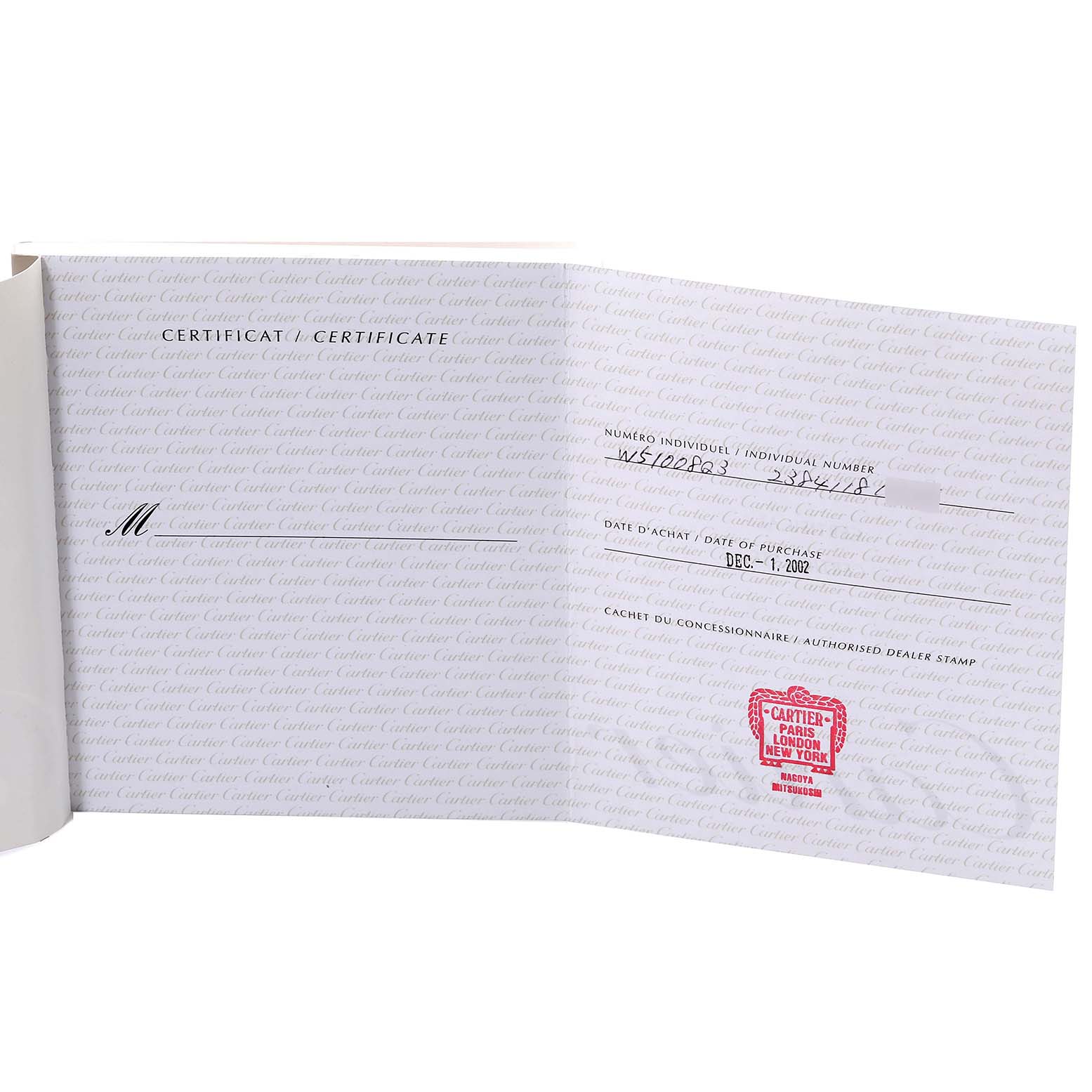The image shows the open certification booklet for a Cartier Tank Française watch.