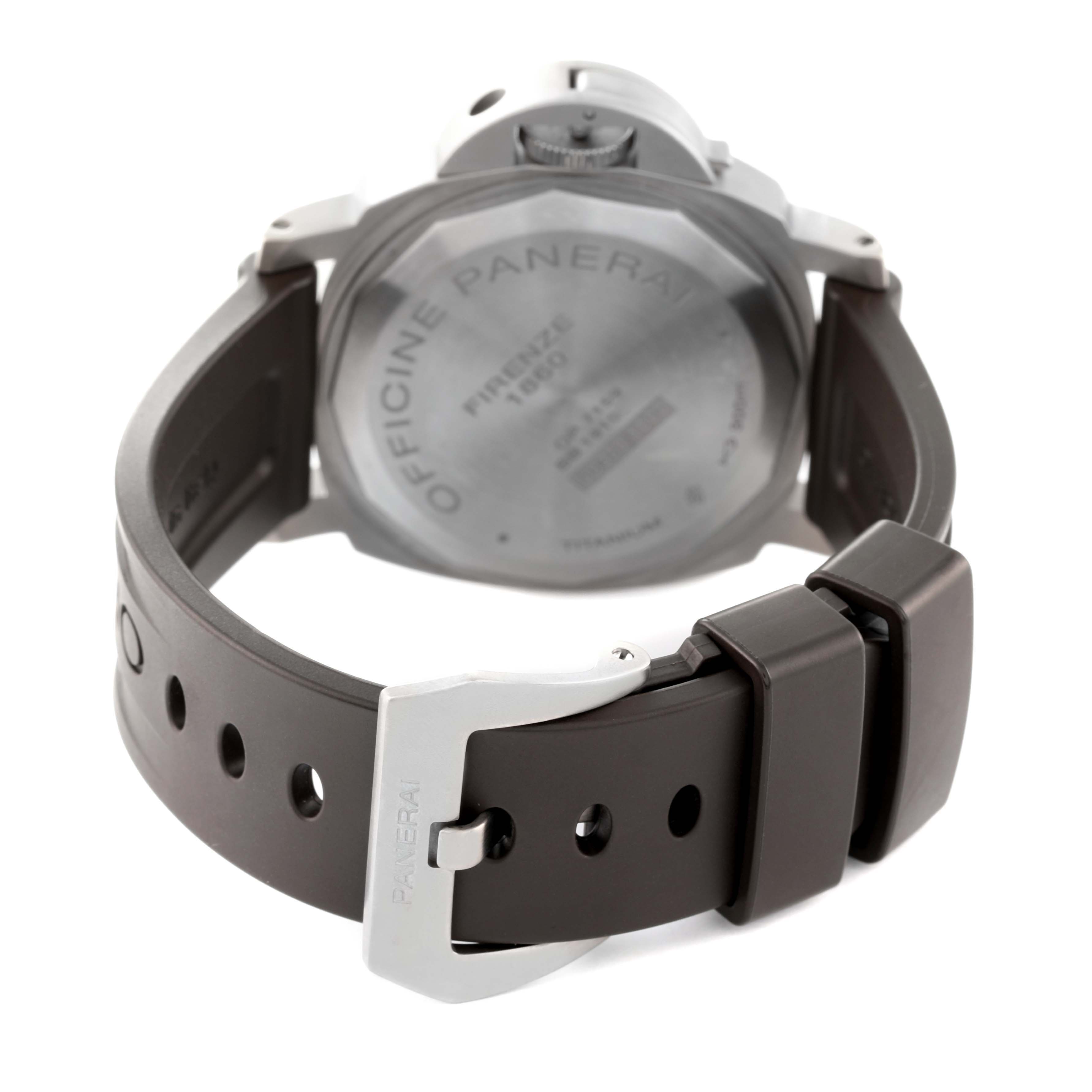 A Panerai Luminor PAM00797 Men's Titanium Brown Dial PAM00797 Men's Titanium Brown Dial watch is shown from the back, showcasing its case back and strap with buckle.