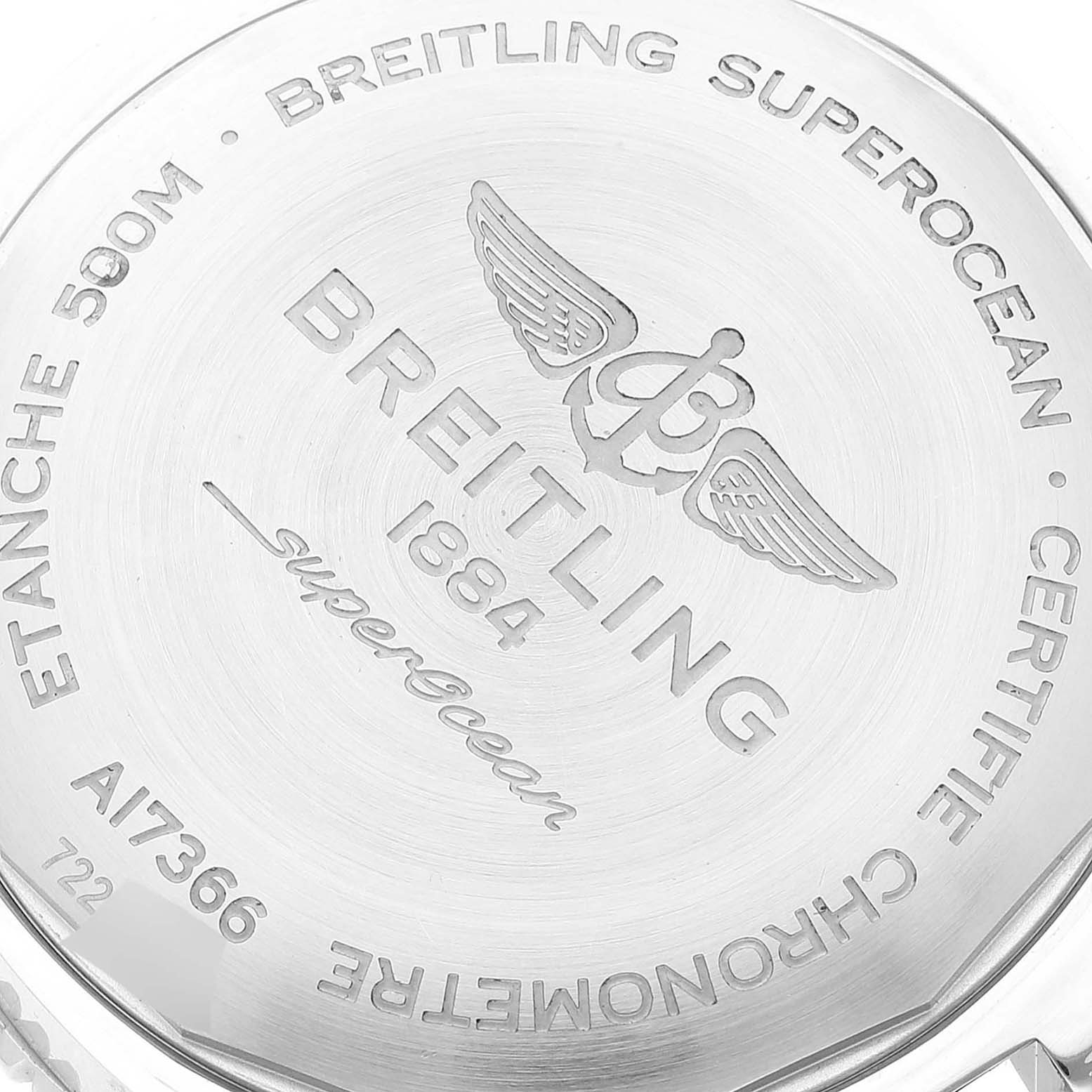 The image shows the engraved back case of a Breitling Superocean A17366 Men's Stainless Steel White Dial A17366 Men's Stainless Steel White Dial watch, displaying the brand logo and model details.
