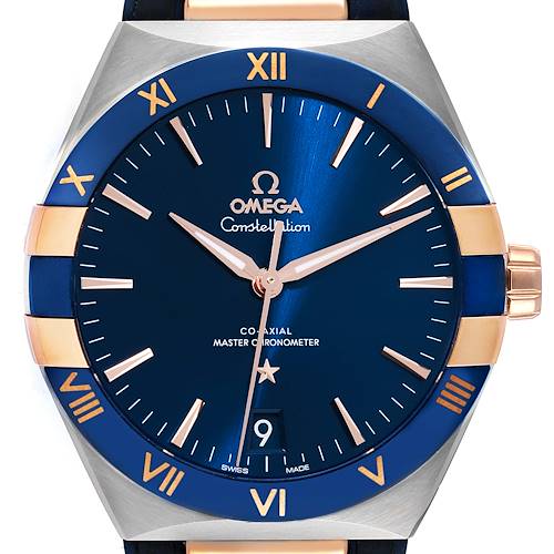 The image shows a front view of the Omega Constellation 131.23.41.21.03.001 Men's Steel and Gold (two tone) Blue Dial 131.23.41.21.03.001 Men's Steel and Gold (two tone) Blue Dial watch, highlighting the dial, bezel, and crown.