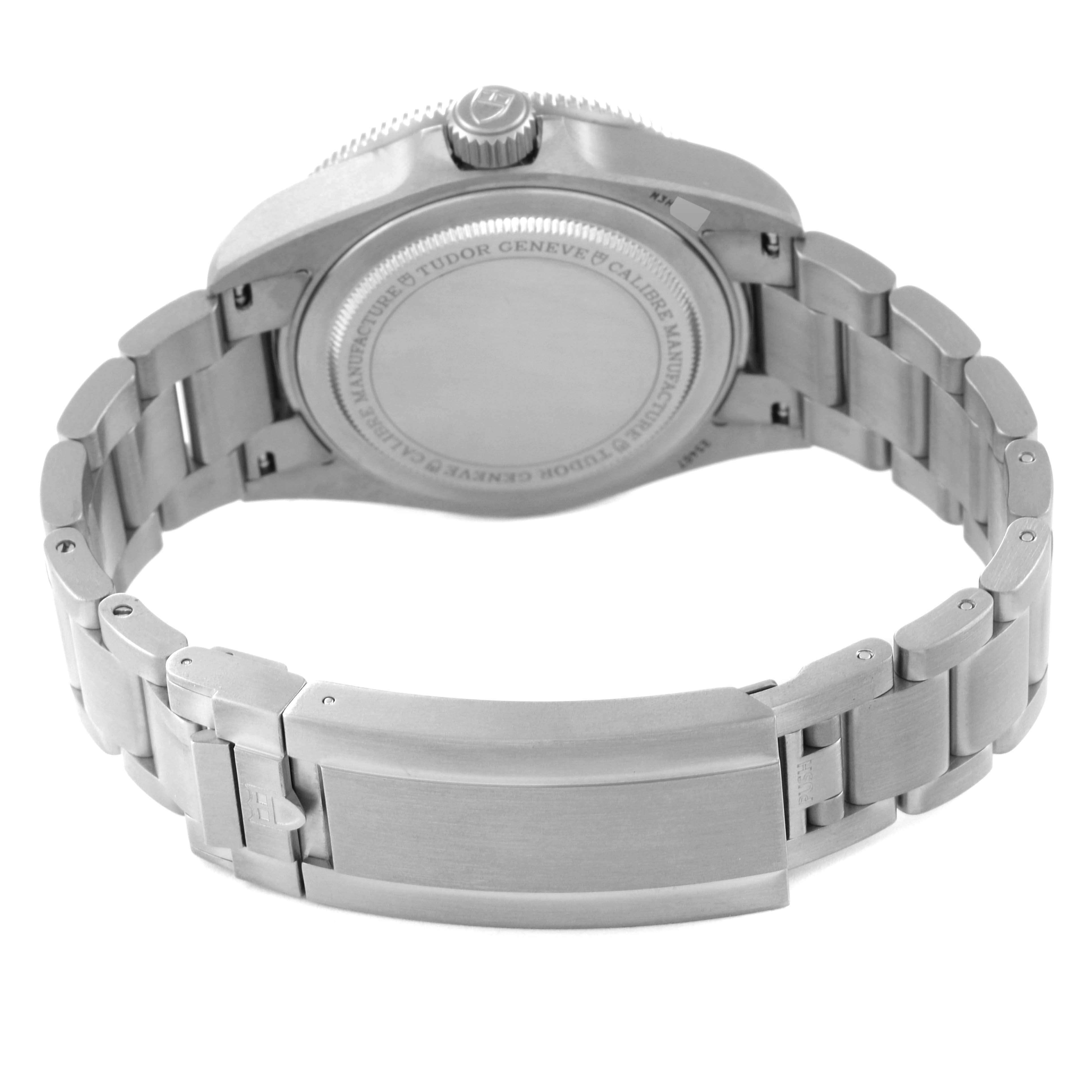 This image shows the backside and clasp of a Tudor Pelagos 25407N Men's Titanium Black Dial 25407N Men's Titanium Black Dial watch, highlighting its metal bracelet and caseback.