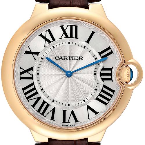 The image shows a close-up of the Cartier Ballon Bleu W690054 Men's Yellow Gold Silver Dial W690054 Men's Yellow Gold Silver Dial watch face, highlighting its Roman numerals and blue hands.