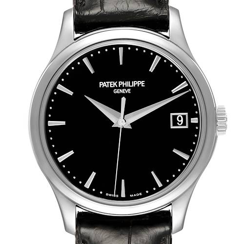This image shows a Patek Philippe Calatrava 5227G Men's White Gold Black Dial watch from the front, highlighting the black dial, silver markers, and date window.
