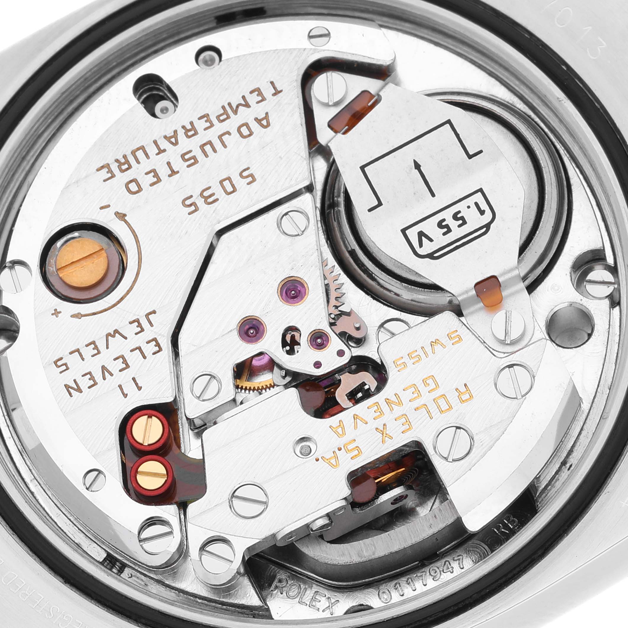 This close-up image shows the intricate inner workings of a Rolex Oysterquartz 17013 Men's Stainless Steel Silver Dial 17013 Men's Stainless Steel Silver Dial watch movement.