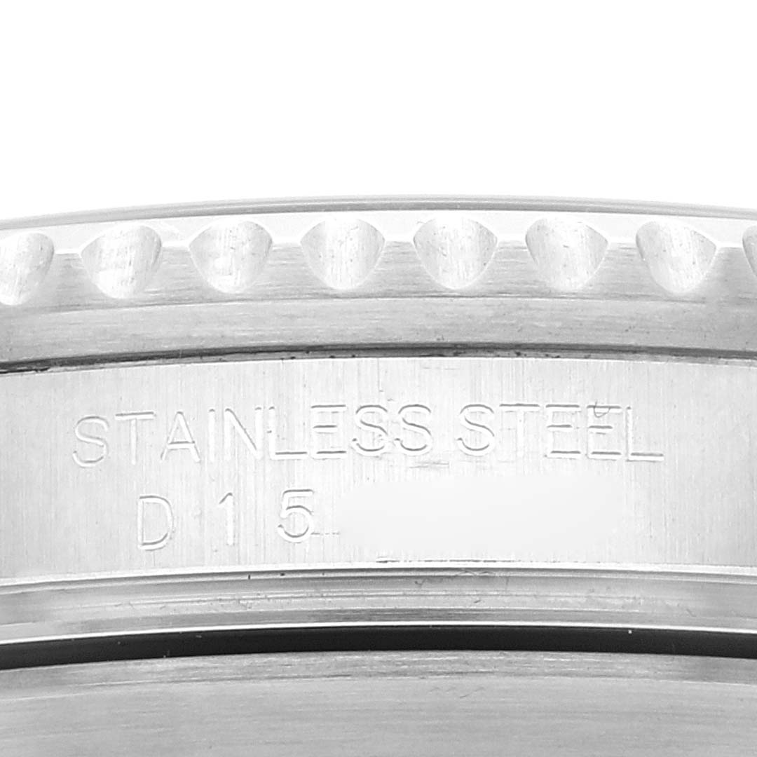 This close-up image shows the stainless steel casing of a Rolex Submariner 16610LV Men's Stainless Steel Black Dial 16610LV Men's Stainless Steel Black Dial watch, focusing on the engraved text.