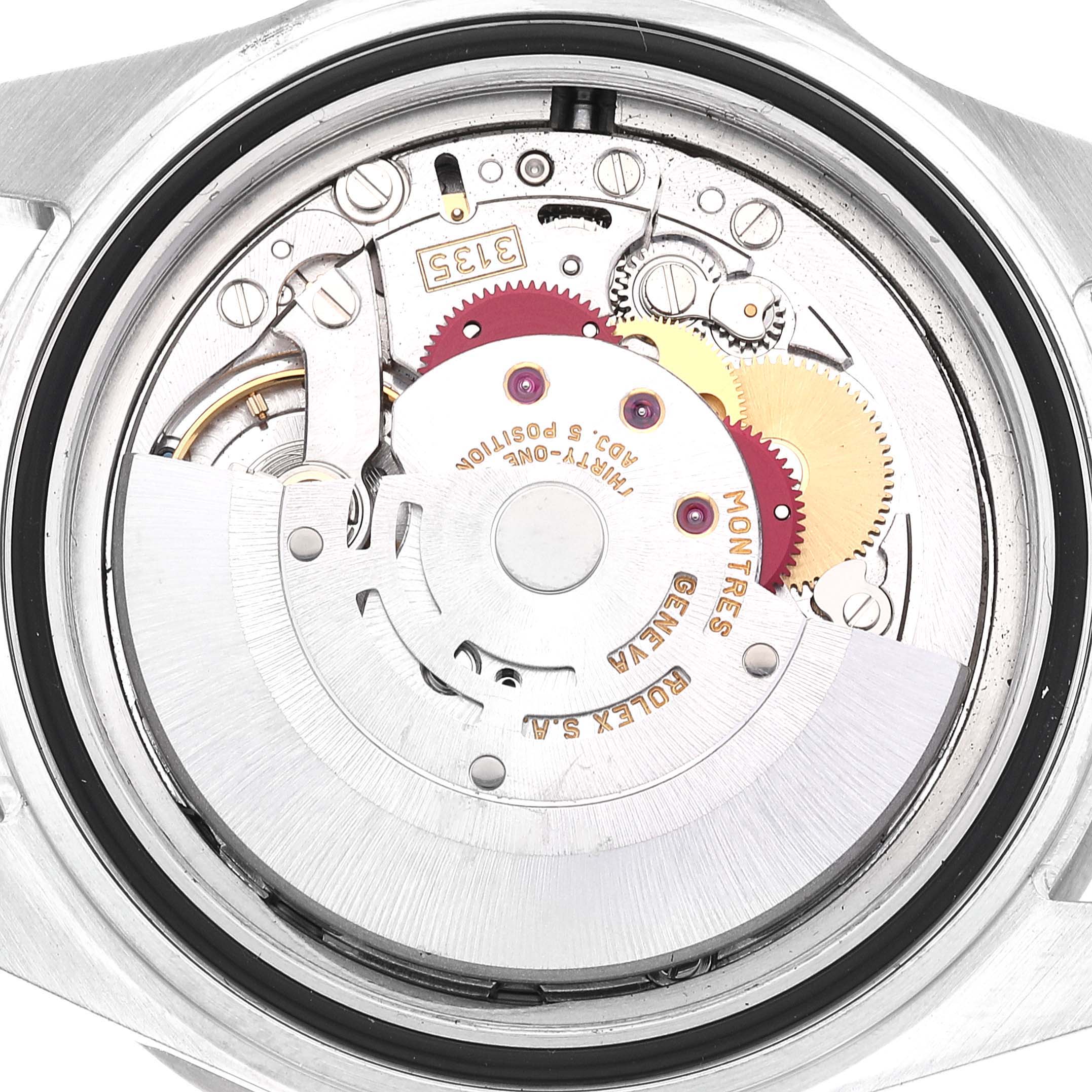 This is a close-up view showing the internal movement mechanism of a Rolex Submariner 16610LV Men's Stainless Steel Black Dial 16610LV Men's Stainless Steel Black Dial watch.