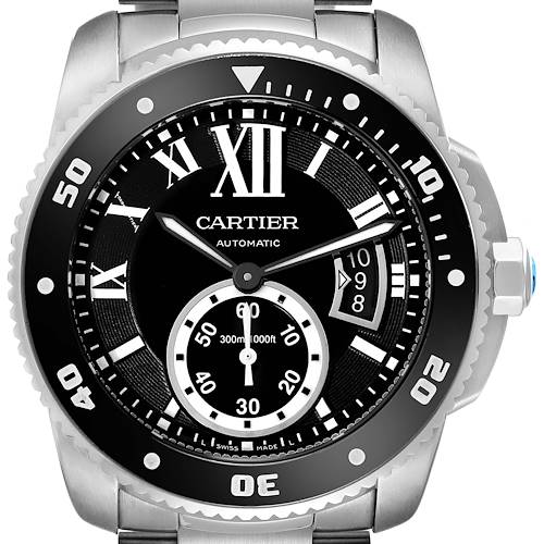 The image shows a Calibre de Cartier model by Cartier, featuring a close-up view of the watch face, bezel, and part of the bracelet.
