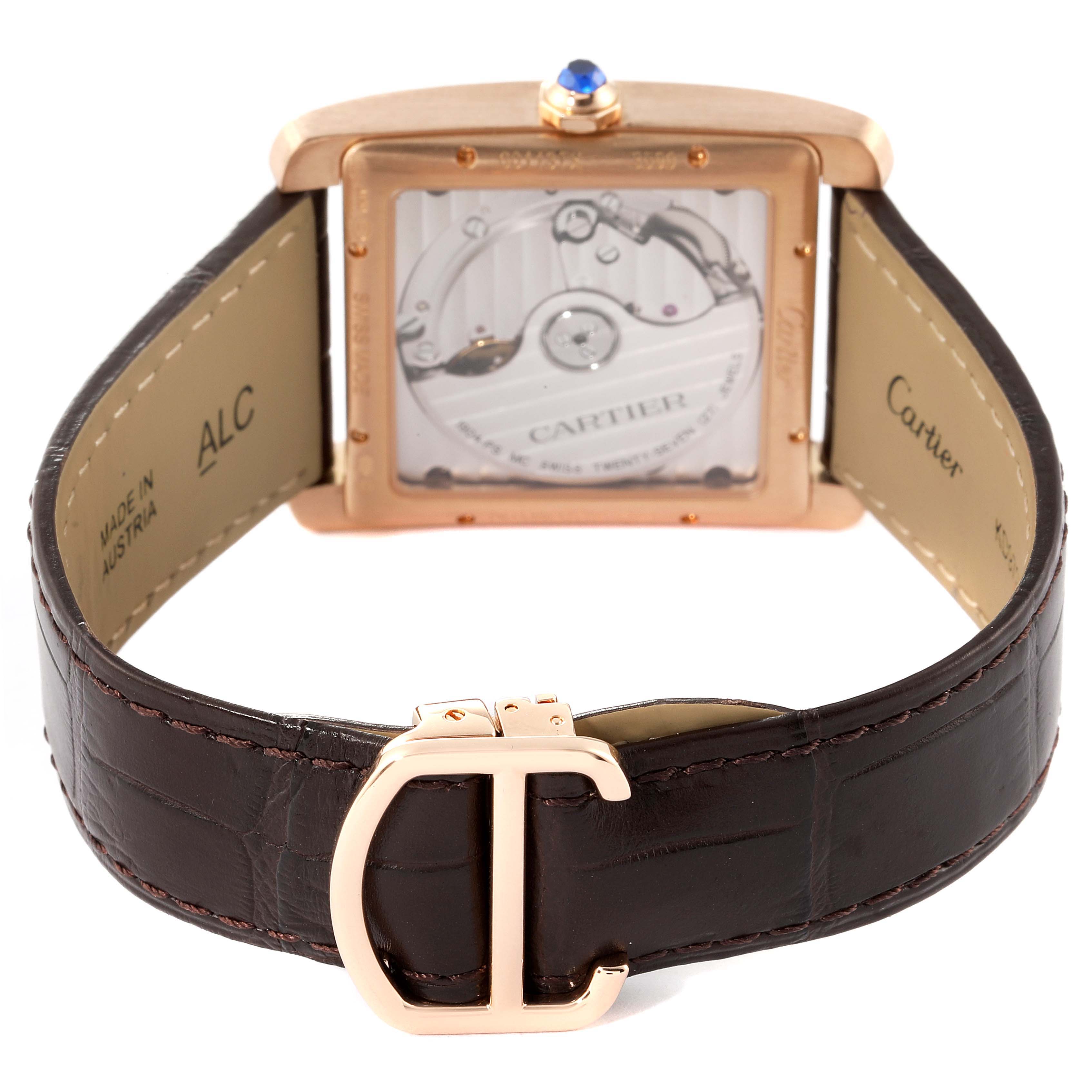 The image shows the back view of the Cartier Tank MC W5330002 Men's Rose Gold Brown Dial W5330002 Men's Rose Gold Brown Dial watch, highlighting the movement, crown, and leather strap with the Cartier clasp.