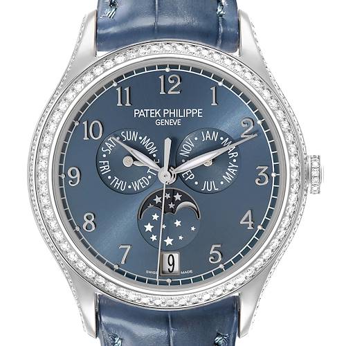 The Patek Philippe Complications 4947G-001 Men's White Gold Blue Dial watch is shown from a front angle, highlighting the face, subdials, and diamond bezel.
