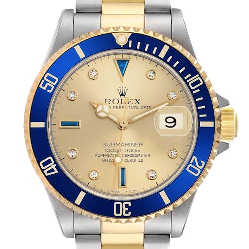The Rolex Submariner 16613 Men's Steel and Gold (two tone) Champagne Dial watch is shown from the front, displaying its dial, blue bezel, and two-tone bracelet.