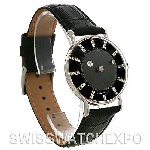 This image shows a vintage Vacheron Constantin watch at a 3/4 angle, displaying the bezel, face, and black leather strap.