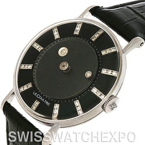 The image shows a Vacheron Constantin Vintage White Gold Black Dial White Gold Black Dial watch from an angled side profile, focusing on its black dial, diamond markers, and crown.